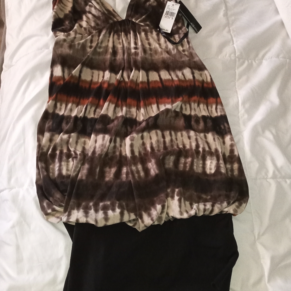 ABG DRESS. Sleeveless. Size 8. Black,browns